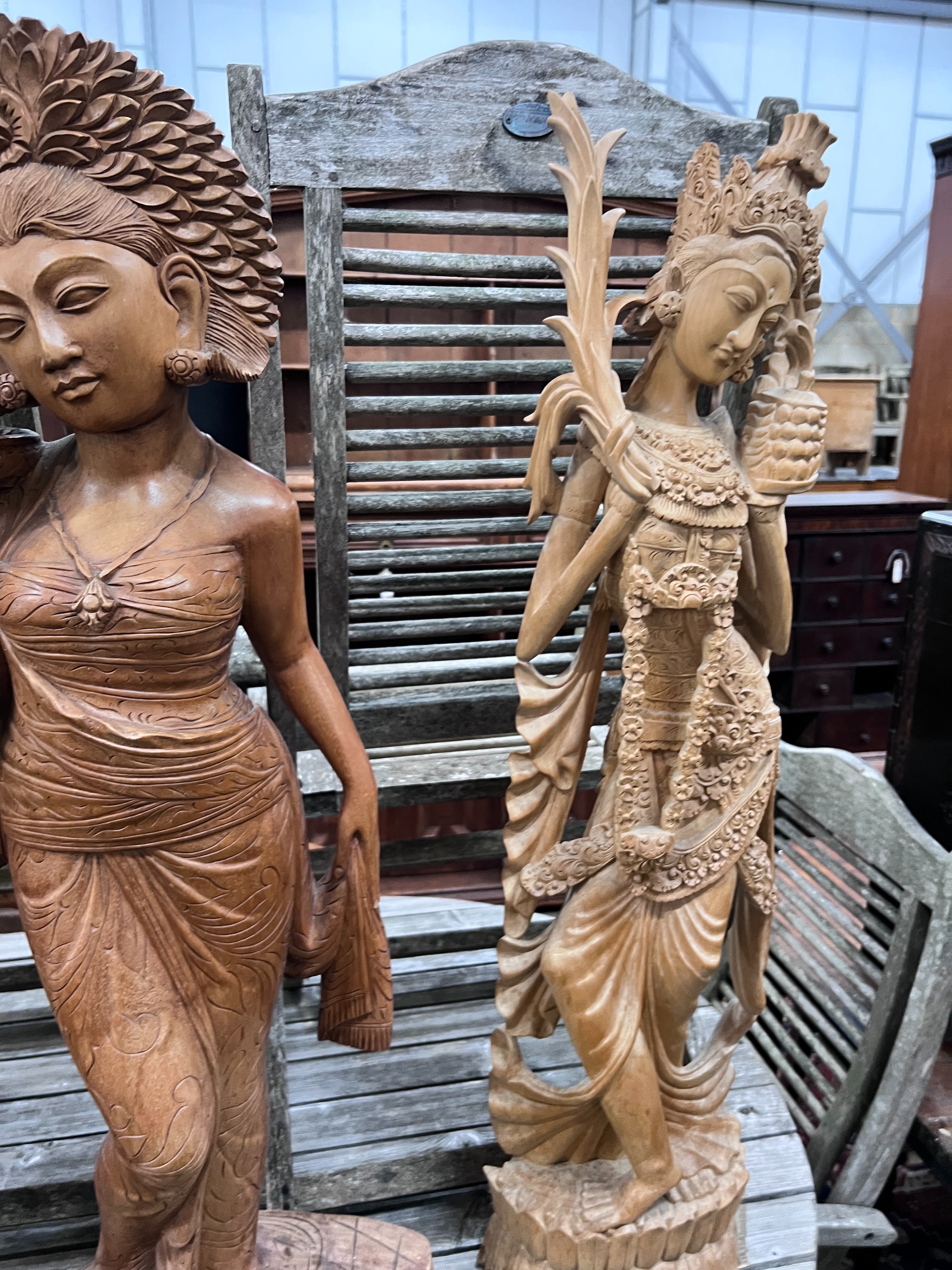 Six Balinese carved hardwood figures, largest height 104cm *Please note the sale commences at 9am.